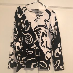 la madonna sweater with sewn on appliqué.